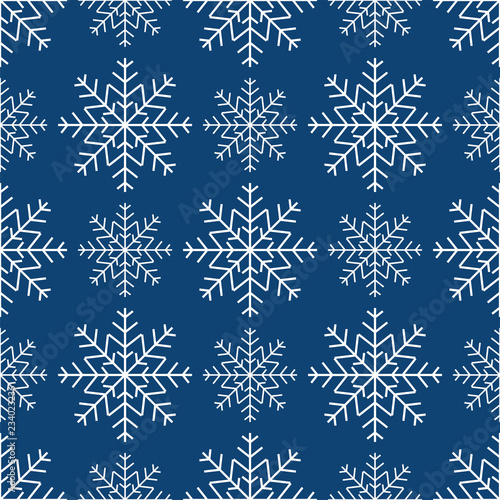 Seamless pattern of snowflakes. Winter background.