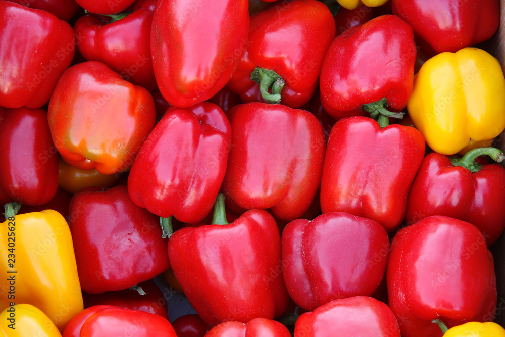 red and yellow peppers background red and yellow peppers background