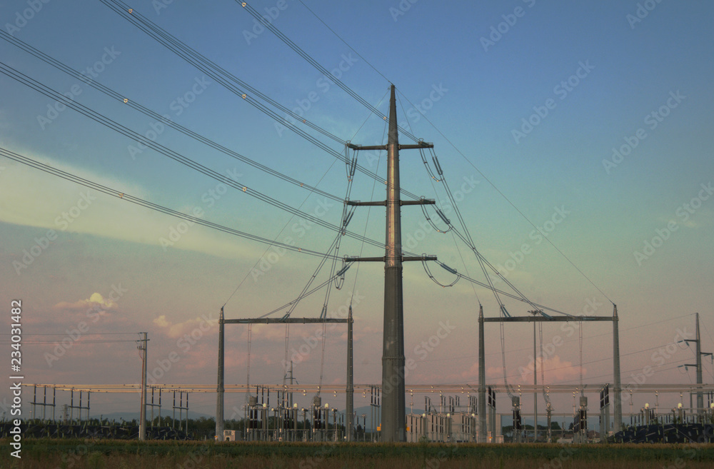 Electricity grid large pylon tower around transformers
