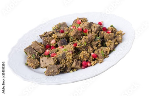 Baked beef liver with walnuts.