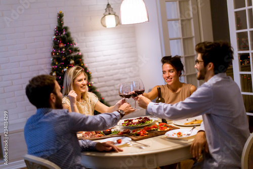 Friends celebrating Christm...