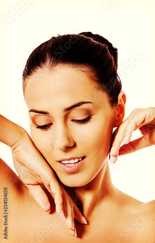 Beautiful face of young woman with clean fresh skin.