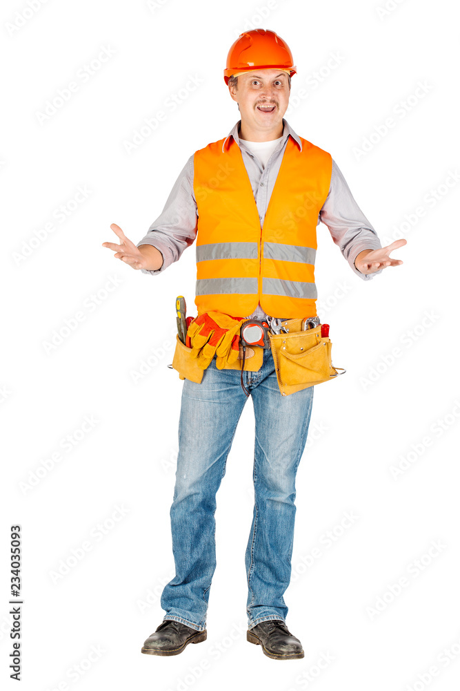 Portrait of a male builder in a helmet looking at camera over white wall background. repair, construction, building, people and maintenance concept. Portrait of a male builder in a helmet looking at camera over white wall background. repair, construction, building, people and maintenance concept.