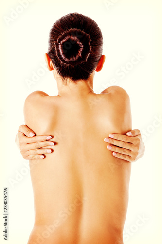 Young beauty nude women back, isolated on white.