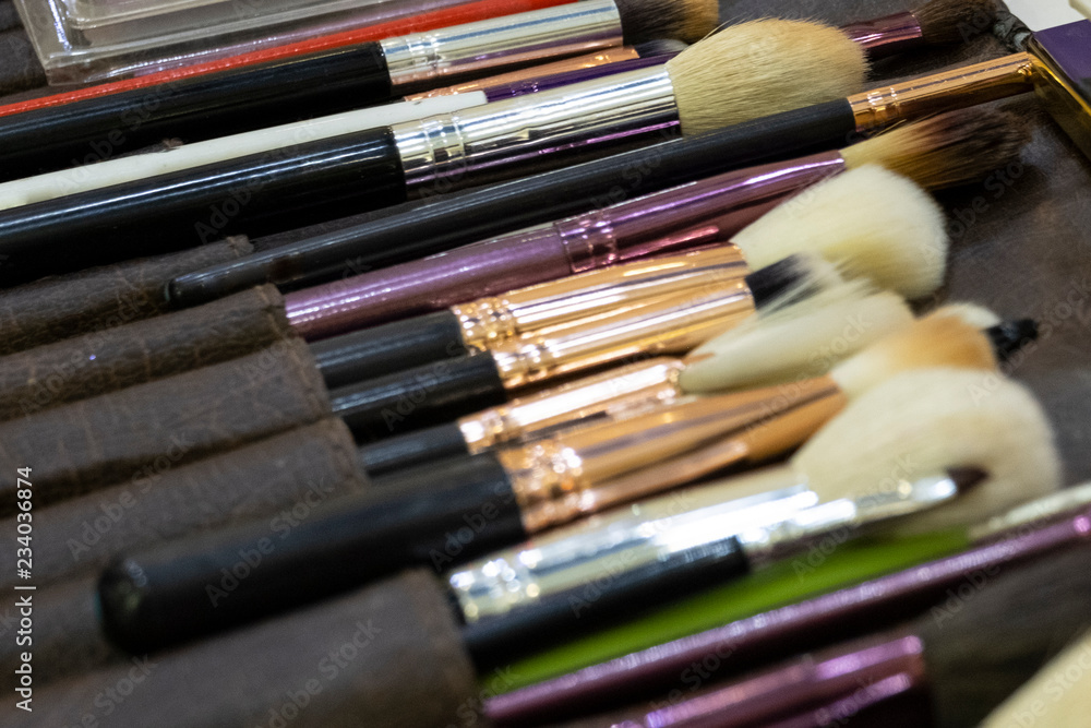 Fototapeta premium Makeup artist brushes. Background. Theme of fashion style.