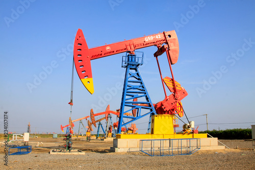 crank balanced beam pumping unit in the JiDong oilfield, China.