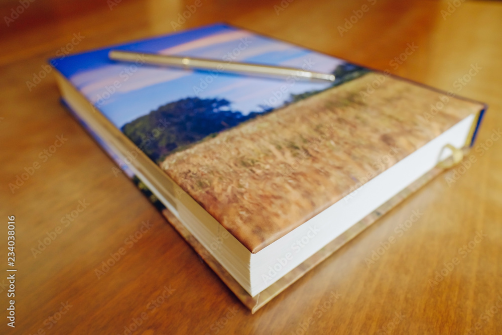 Fototapeta premium business communication and work planning. notebook with pen on the table