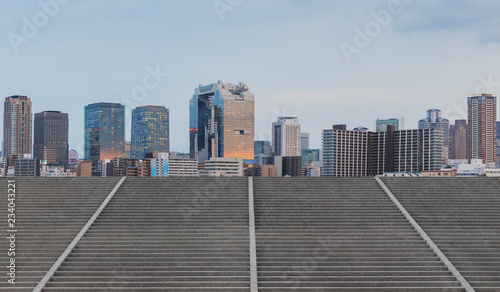 Panoramic city skyline and buildings with empty concrete stairway  © SasinParaksa