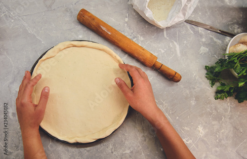 Roll out dough in pizza shape