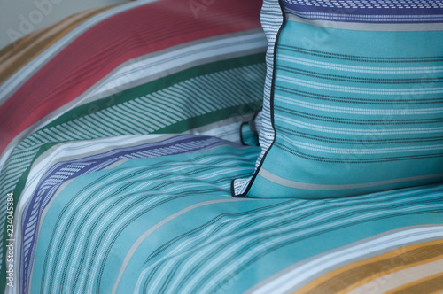 closeup of colorful set of bed linen in store showroom