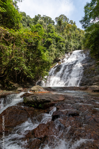 Beautiful waterfall flowing through a tropical rain forest in Thailand  Ton Prai  Lam Ru  Thailand 