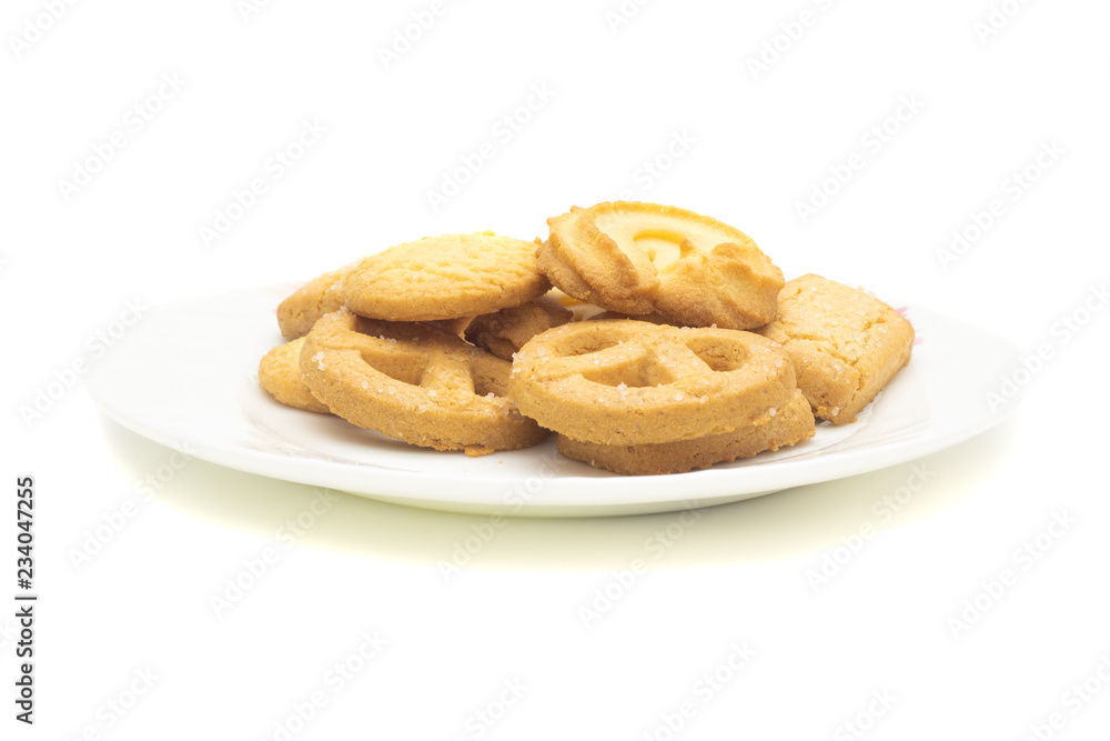 one side of butter cookies on plate with white background .