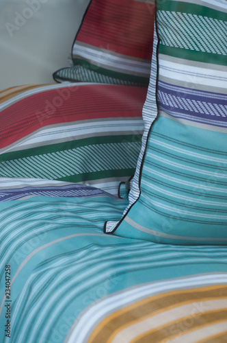 closeup of colorful set of bed linen in store showroom