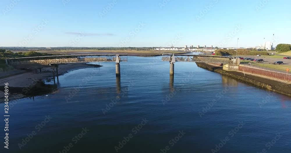 Drone Shot of Short Moveable Bridge off an Island in Scotland at Sunset Drone Shot of Short Moveable Bridge off an Island in Scotland at Sunset