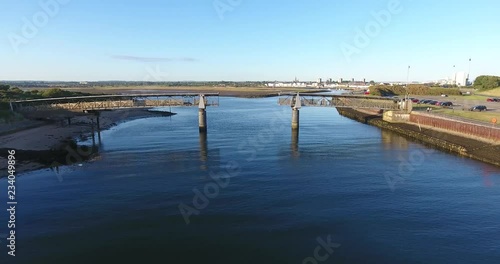 Wallpaper Mural Drone Shot of Short Moveable Bridge off an Island in Scotland at Sunset Torontodigital.ca