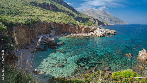 Panorama of Cala Disa, one of the beautiful beaches in nature reserve Zingaro in Sicily photo
