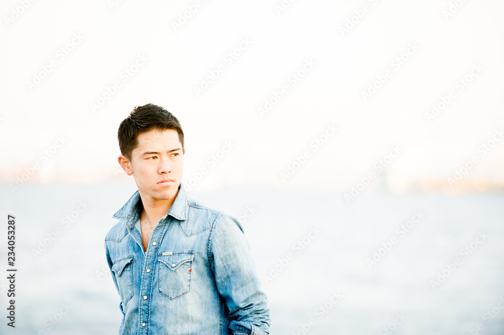 Japanese guy poses for pictures in Tokyo, Japan Japanese guy poses for pictures in Tokyo, Japan