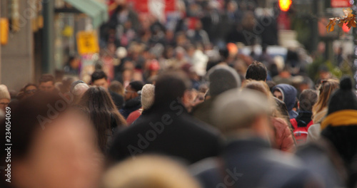 Crowd of people walking street © blvdone