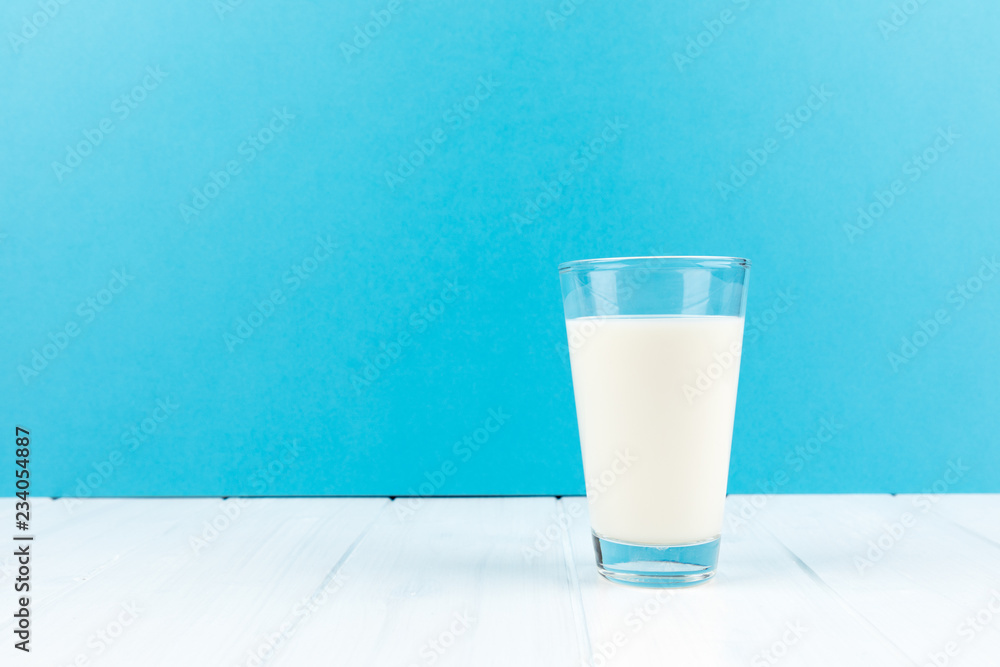 milk glass blue background copy space milk glass blue background copy space