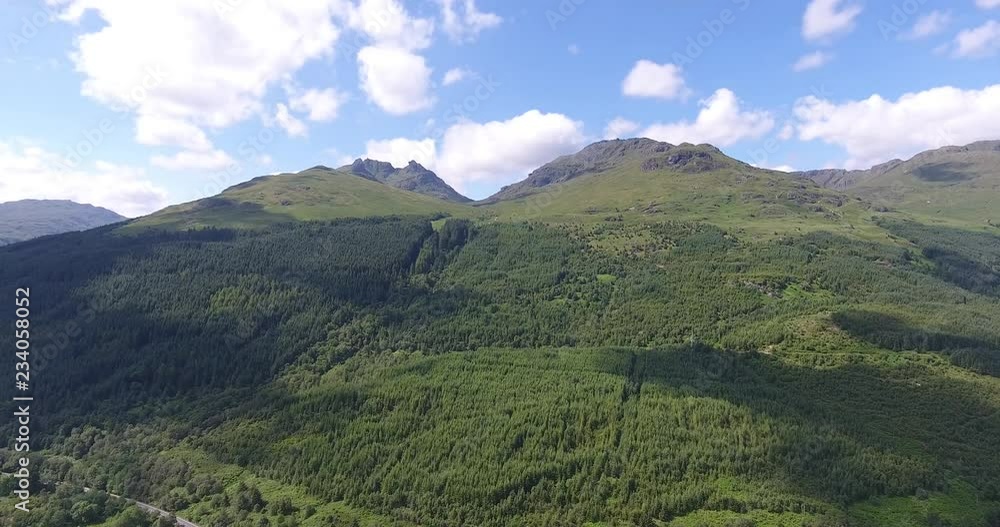 Blue Green Lake Drone Shot with Forested Landscape in Scotland - Aerial View Loch Fyne in the Highlands Blue Green Lake Drone Shot with Forested Landscape in Scotland - Aerial View Loch Fyne in the Highlands