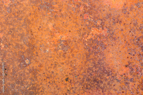 Red rusty sheet of a metral, background.