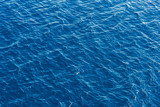 Background of rippled blue sea surface.