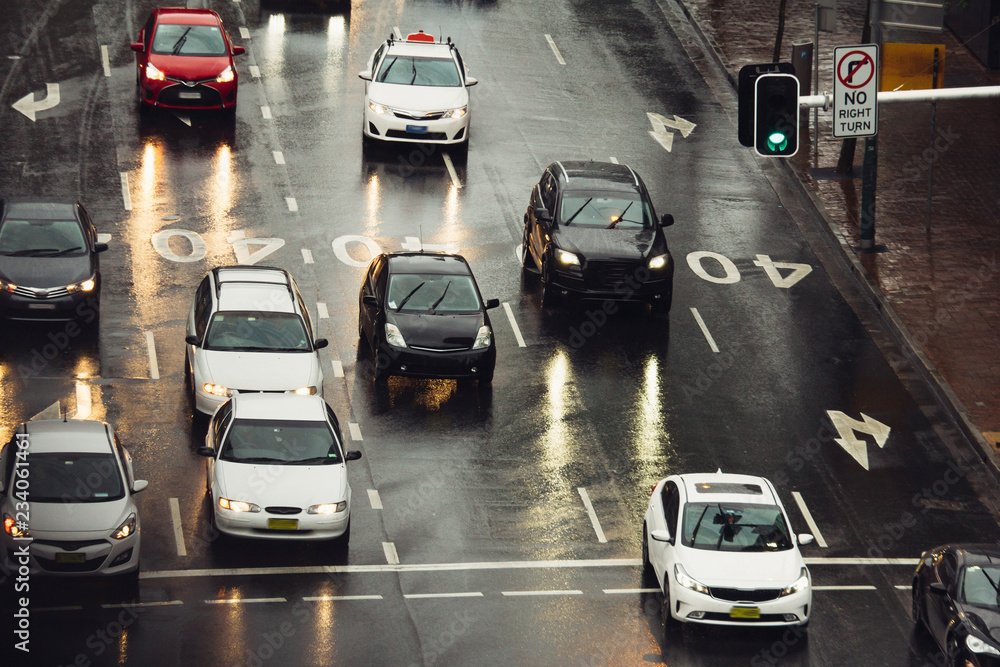 Traffic at city street on a rainy day