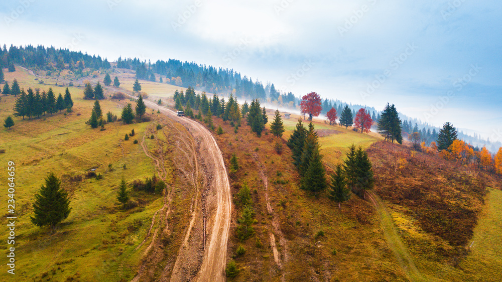 Muddy hillside in autumn rainy season.