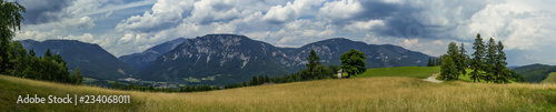 A plane and mountains in the Rax Alps