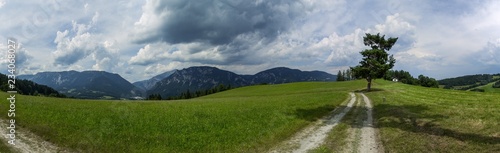 A path on a plain and mountains in the Rax Alps