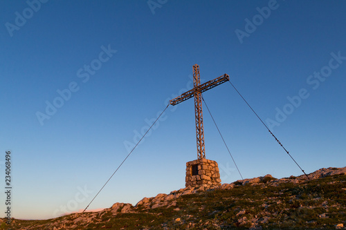 A big cross on the top of the mountain Jakobskogel