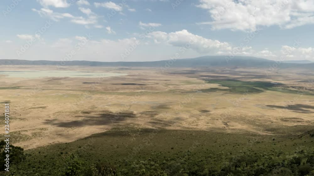 a wide angle time lapse of ngorongoro crater, part of the ngorongoro conservation area, in tanzania a wide angle time lapse of ngorongoro crater, part of the ngorongoro conservation area, in tanzania