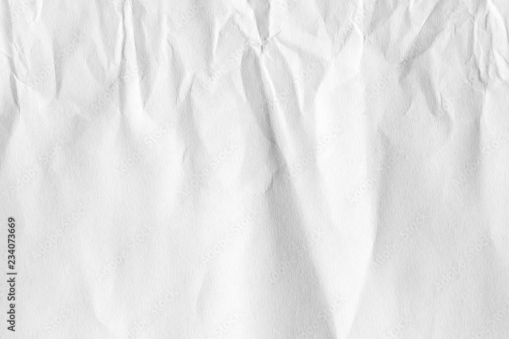 The background is white. Texture of paper with kinks and dents, old and dilapidated. The background is white. Texture of paper with kinks and dents, old and dilapidated.