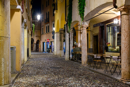 Fototapeta Naklejka Na Ścianę i Meble -  Night view of  narrow street in Padua (Padova), Veneto, Italy