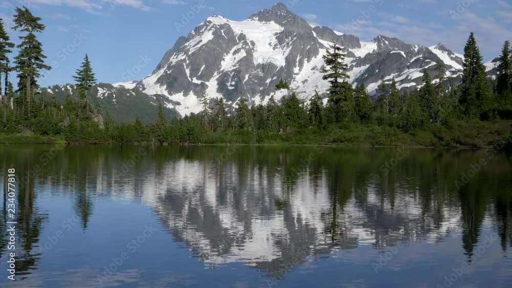 afternoon pan of mt shuksan and picture lake at washington state in the us pacific northwest afternoon pan of mt shuksan and picture lake at washington state in the us pacific northwest