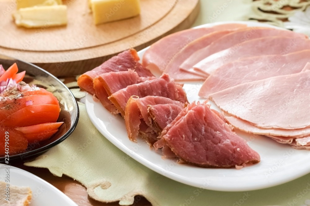 a platter with cold meats