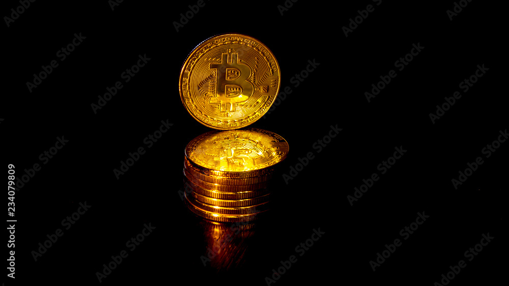 Gold crypto coin bitcoin on a black background (2)