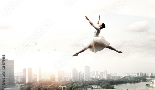 Elegant ballerina dancing. Mixed media
