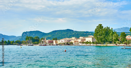 Lake Garda with nice walkways and beaches at Bardolino in Italy © marako85