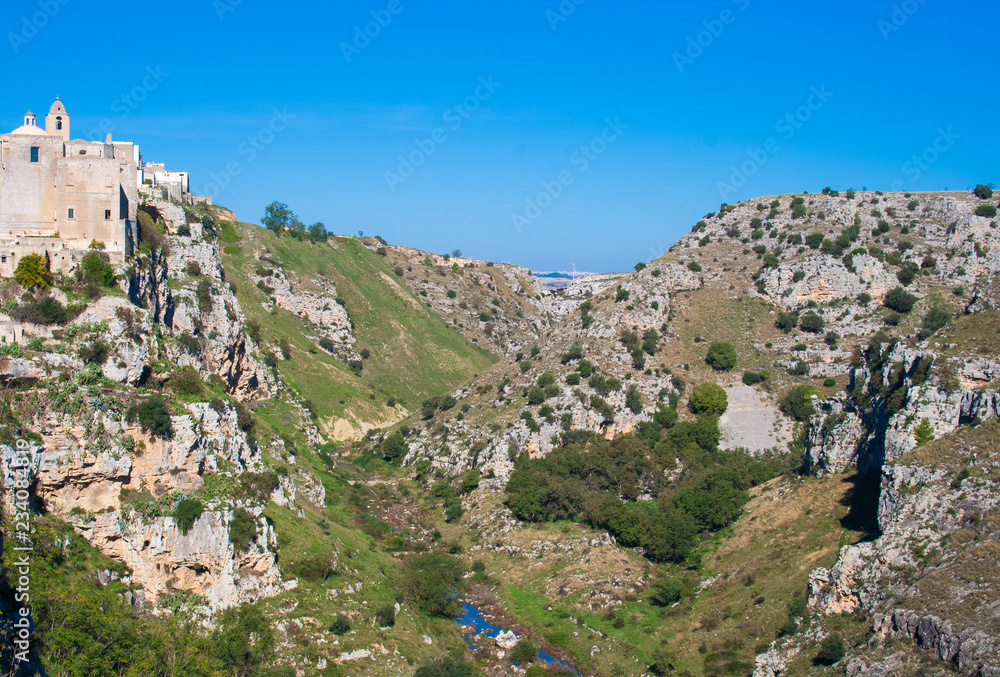 Obraz premium Canyon with river. Sassi or stones of Matera European capital of culture 2019, Basilicata, Italy
