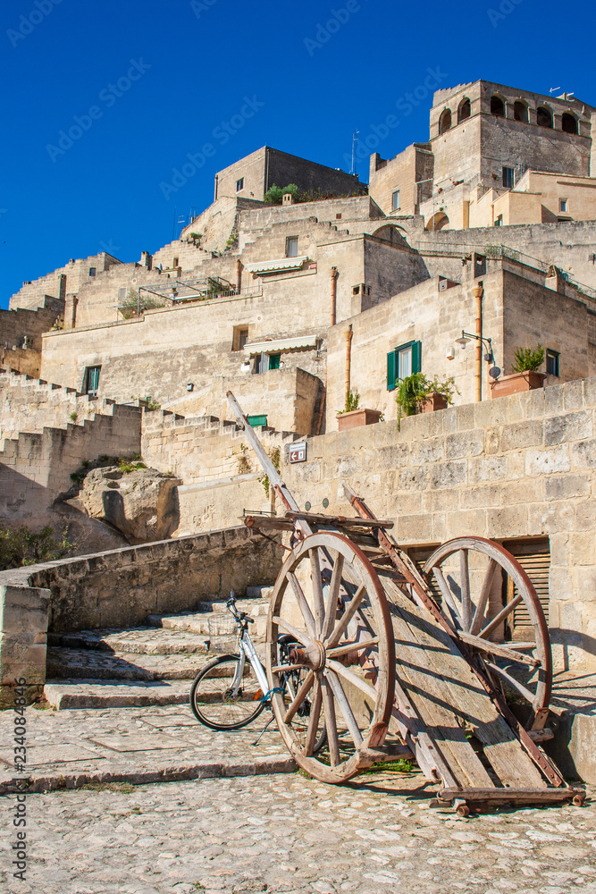 Old wooden farm cart. Sassi or stones of Matera European capital of culture 2019, Basilicata, Italy