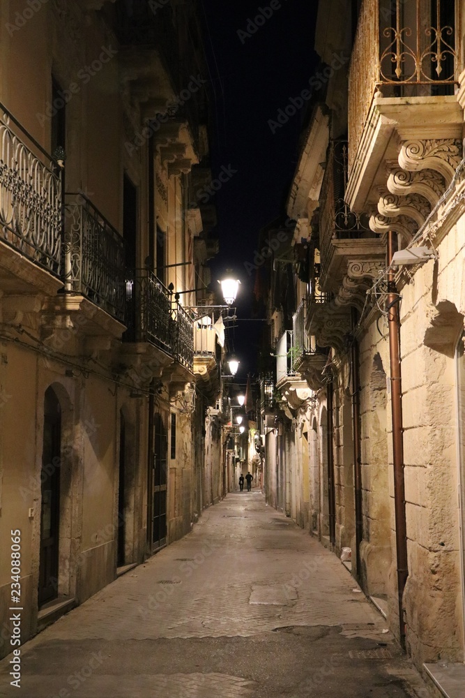 Night at old alley in Ortigia Syracuse, Sicily Italy 