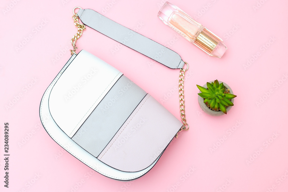 Women's accessories on pink background. Flat lay Women's accessories on pink background. Flat lay