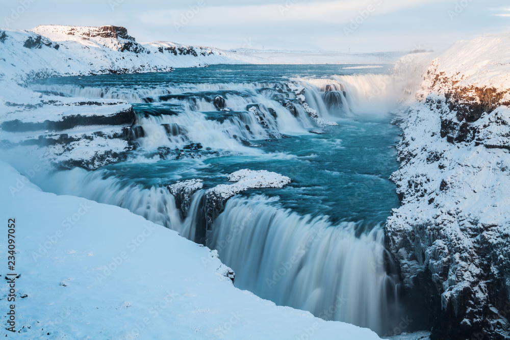 Obraz premium Gullfoss waterfall view in the canyon of the Hvita river during winter snow Iceland