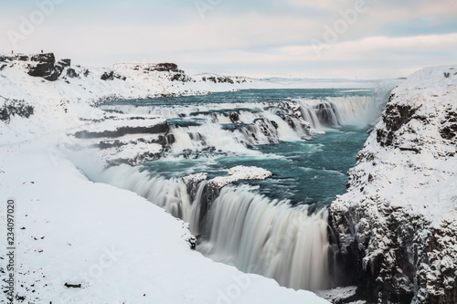 Gullfoss waterfall view in the canyon of the Hvita river during winter snow Iceland photo