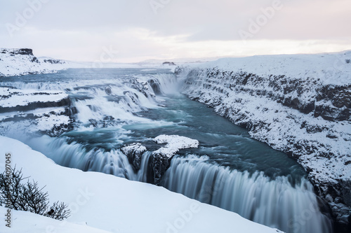 Gullfoss waterfall view in the canyon of the Hvita river during winter snow Iceland
