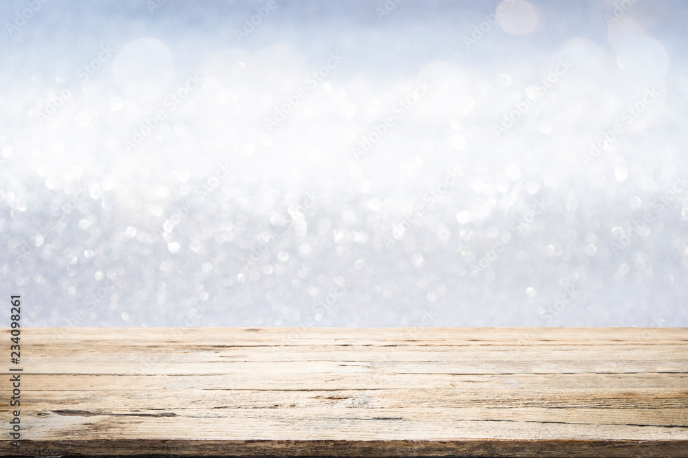 Wooden table with blur bokeh background. Wooden table with blur bokeh background.