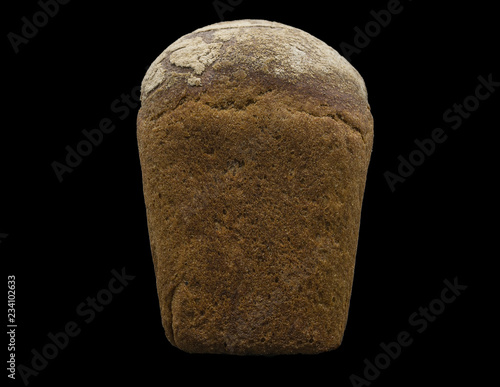 Grey bread loaf isolated on black background