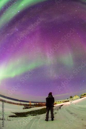 Aurora Borealis or better known as The Northern Lights for background view in Iceland, Reykjavik during winter