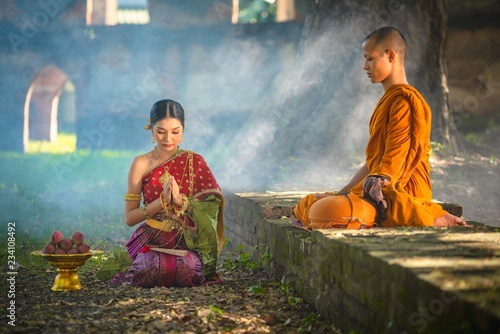 Photography present food to a Buddhist priest